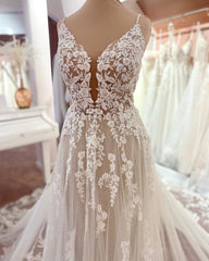 Elegant Boho Lace Wedding Dress with Floral V-neck and Tulle A-line