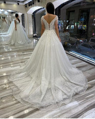 Elegant Sweetheart Backless A-Line Wedding Gown with Sequins, Appliques, and Lace Train