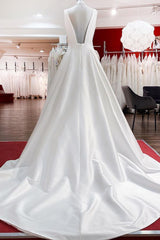 Elegant V-Neck A-Line Long Satin Wedding Dress Featuring Ruffles and Open Back