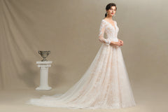 Elegant Long-Sleeve Illusion Wedding Gown in Sheer Tulle with Lace
