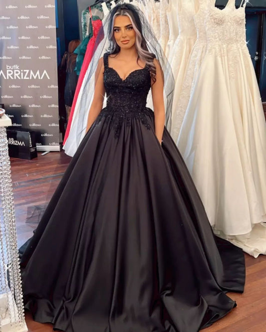 Elegant Black Ball Gown with Wide Straps, Sweetheart Neckline, and Satin Ruffles