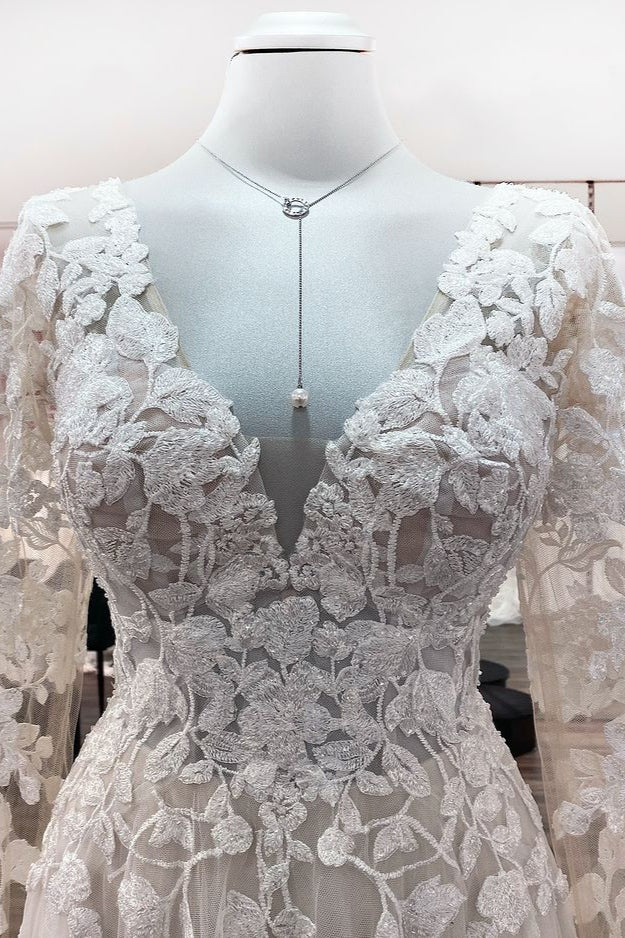 Elegant Ivory A-line Wedding Dress with Long Lace Sleeves and Open Back Tulle Details