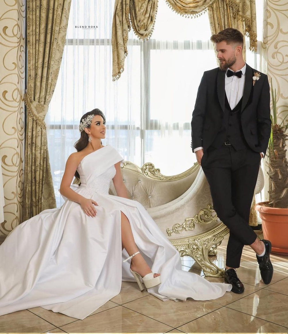 Elegant One-Shoulder A-Line Satin Wedding Gown Featuring a Slit