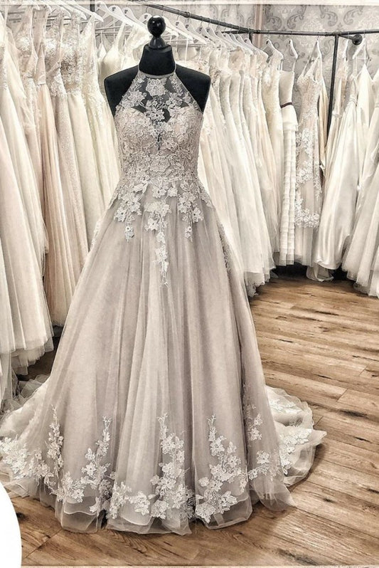 Elegant Backless Halter Wedding Dress with Lace Appliques and Tulle Ruffles