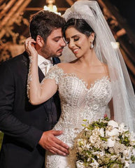 Elegant Off-the-Shoulder Mermaid Wedding Gown with Lace Appliques and Long Sleeves