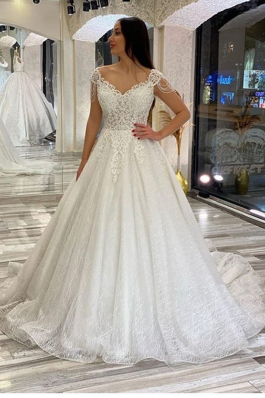 Elegant Sweetheart Backless A-Line Wedding Gown with Sequins, Appliques, and Lace Train