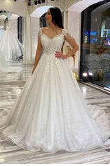 Elegant Sweetheart Backless A-Line Wedding Gown with Sequins, Appliques, and Lace Train
