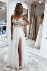 Elegant V-neck A-line Long Tulle Wedding Dress Featuring a Slit