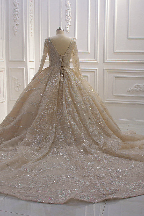 Elegant V-neck Ball Gown with Long Sleeves, Sequins, Beading, and Ruffles