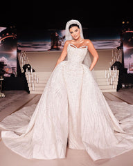 White Sleeveless Wedding Dress with Sequins and Beads on the Trail