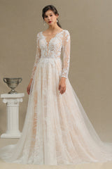 Elegant Long-Sleeve Illusion Wedding Gown in Sheer Tulle with Lace