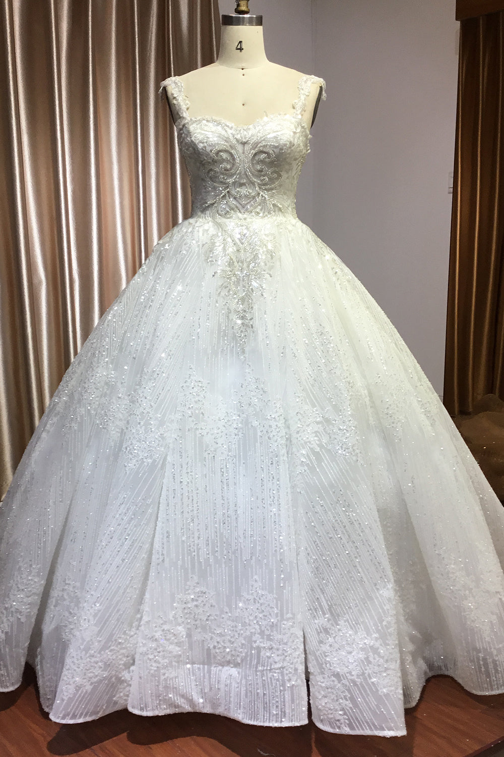 Elegant Sweetheart Ball Gown with Pleated Straps and Sequins
