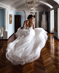 Elegant A-line Tulle Wedding Dress with Spaghetti Straps and Lace
