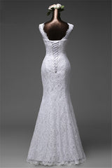 Elegant Long Mermaid Wedding Gown Featuring Lace and Jewel Tones