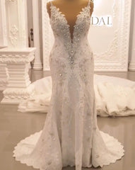 Sweetheart Backless Wedding Dress with Elegant Spaghetti Straps and A-line Appliques Lace