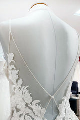Elegant Princess V-Neck Wedding Gown with Long Spaghetti Straps and Sequined Lace Appliques