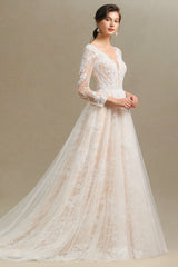 Elegant Long-Sleeve Illusion Wedding Gown in Sheer Tulle with Lace