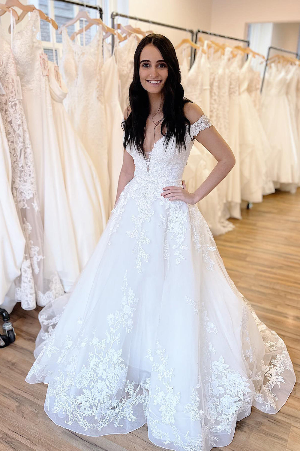 Elegant Sweetheart Wedding Dress with Off-the-Shoulder Neckline and A-Line Lace Appliques