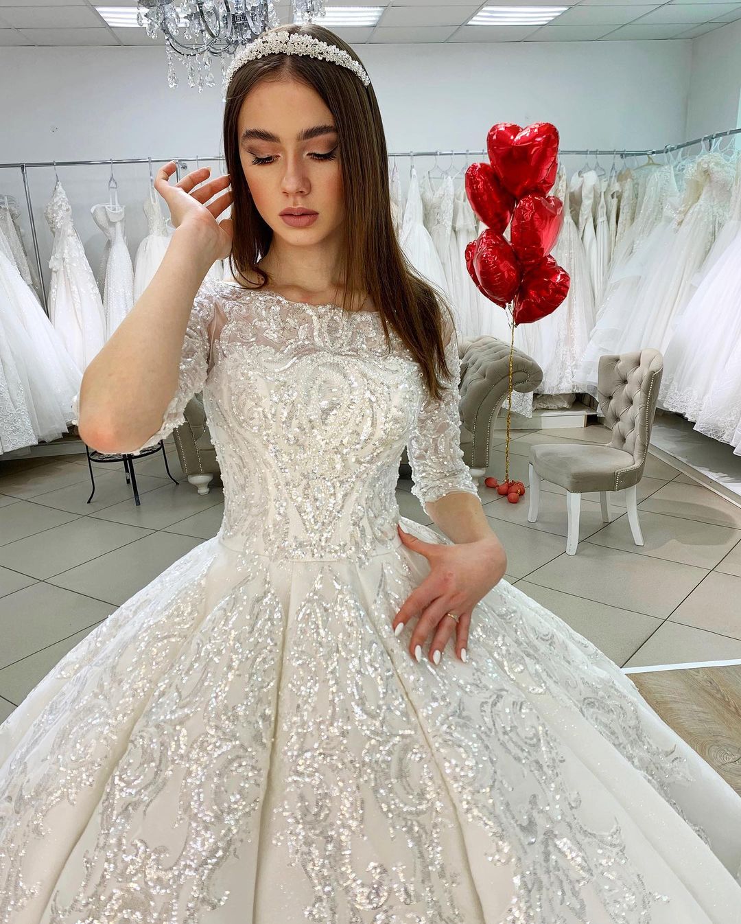 Elegant Satin Princess Bateau Wedding Gown with Long Sleeves and Lace Appliques