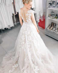 Elegant A-Line Pearl Tulle Wedding Dress with Bateau Neckline and Lace Appliques