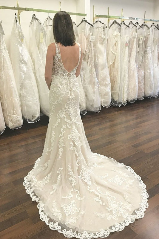 Elegant Mermaid Wedding Dress with Deep V-neck and Lace Open Back, Featuring Wide Straps