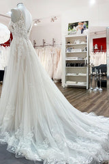 Elegant A-Line Wedding Gown with Long V-Neck and Lace Tulle Spaghetti Straps