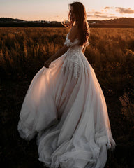 Elegant Off-the-shoulder A-Line Wedding Dress with Lace Appliques and Tulle Train