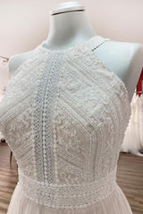 Elegant Backless A-line Wedding Gown with Tulle Lace and Halter Neckline