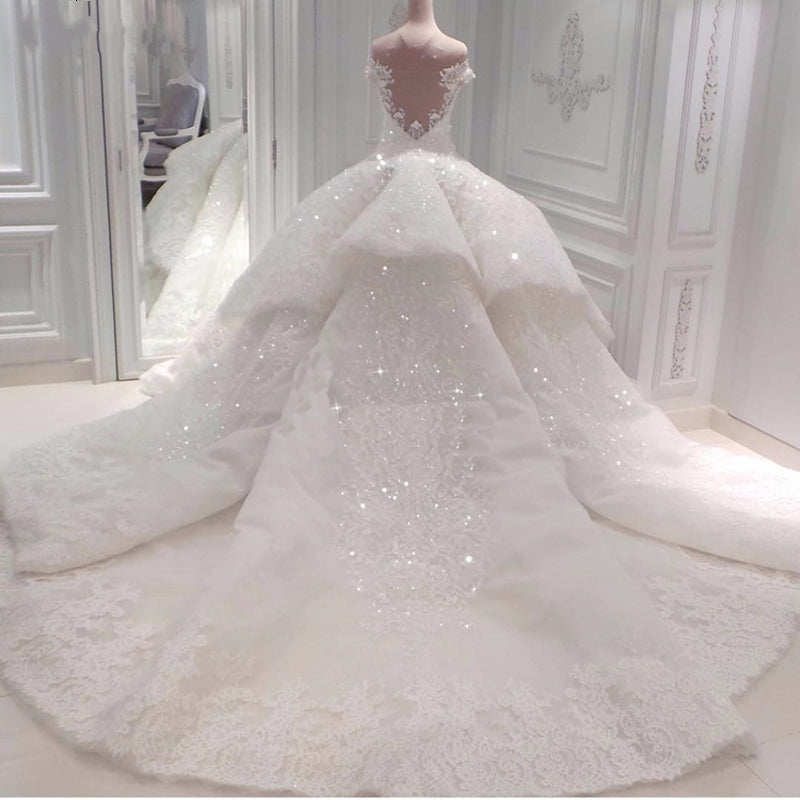 Elegant Off-The-Shoulder Ball Gown Wedding Dress with Beadings