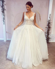 Elegant Backless A-Line Wedding Dress with Deep V-Neck and Lace Appliques