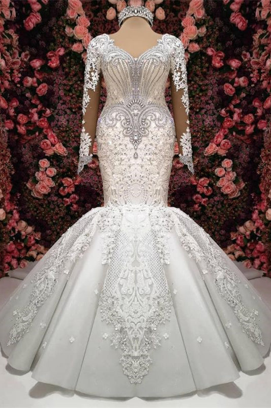 Elegant Sweetheart Mermaid Wedding Dress with Long Sleeves, Lace Appliques, and Beadings Ballbellas