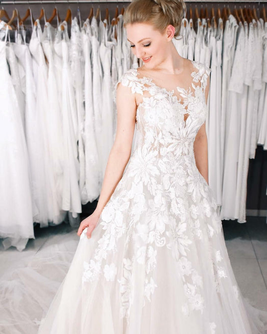 Elegant A-Line Pearl Tulle Wedding Dress with Bateau Neckline and Lace Appliques