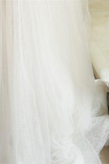 Sleeveless White A-Line Wedding Dress with Elegant Tulle, Spaghetti Straps, Sequins, and Lace