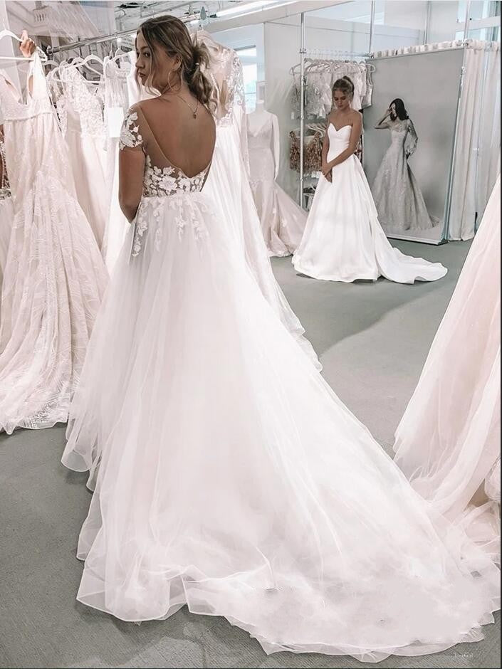 Elegant Bateau Neckline Short Sleeve Floor-Length Tulle A-Line Bridal Gown Featuring Lace Appliques