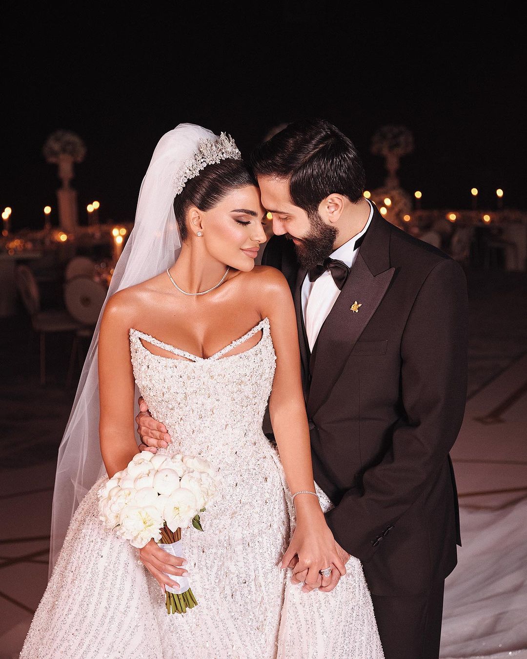 White Sleeveless Wedding Dress with Sequins and Beads on the Trail