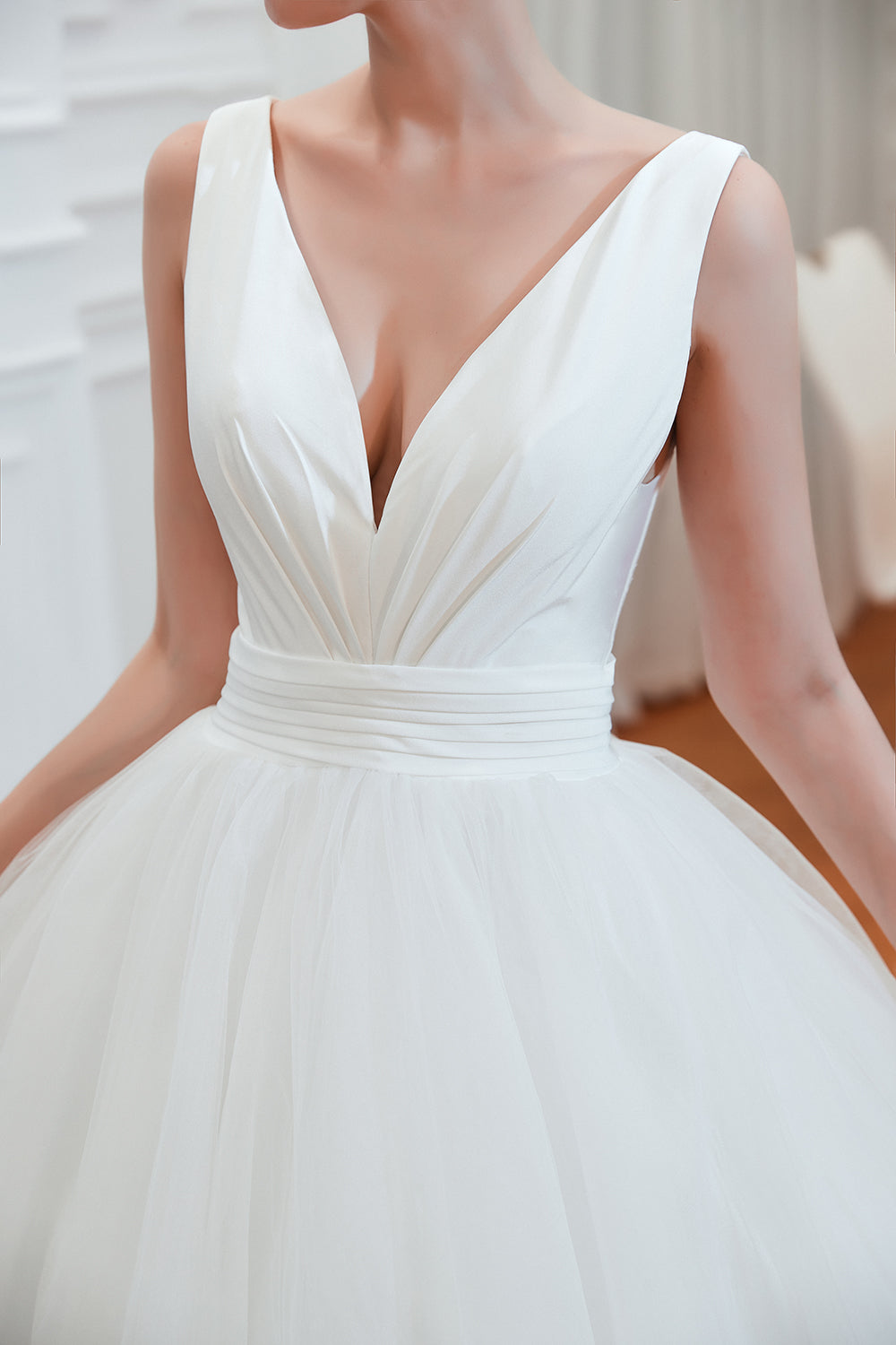 Elegant A-Line Wedding Gown with Deep V-Neck and Wide Tulle Straps