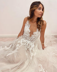 A-Line Floor-Length Wedding Dress with Appliques Lace, Deep V-Neck and Backless Tulle Design