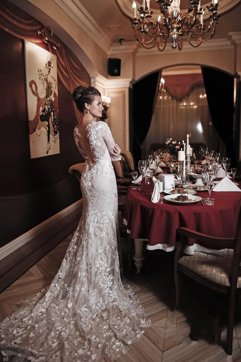 Elegant Backless Mermaid Wedding Gown with Vintage High Neck, Long Sleeves, and Lace Appliques