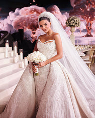 White Sleeveless Wedding Dress with Sequins and Beads on the Trail