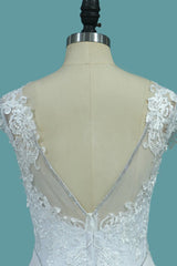Elegant Mermaid Bateau Wedding Gown with Beaded Appliques and Lace