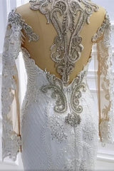 Elegant Mermaid Wedding Gown with Beaded Long Sleeves and Applique