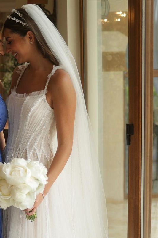 Sleeveless White A-Line Wedding Dress with Elegant Tulle, Spaghetti Straps, Sequins, and Lace