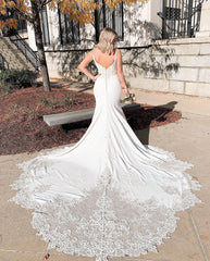 Elegant V-neck Backless Spaghetti Strap Mermaid Bridal Gown Featuring Lace Appliques