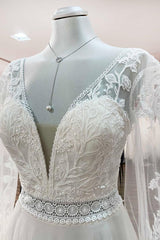Elegant Sweetheart Neckline Long A-line Bridal Gown With Sleeves Featuring Tulle Beadings and Lace
