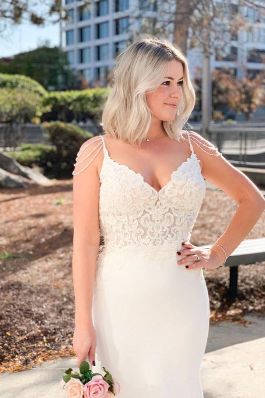 Elegant V-neck Backless Spaghetti Strap Mermaid Bridal Gown Featuring Lace Appliques