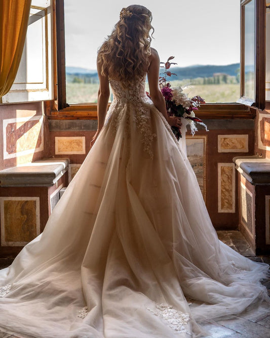 Sweetheart A-Line Wedding Dress with Backless Design and Tulle Floral Lace Train