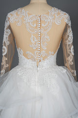 Elegant Long Sleeve Ruffled Ball Gown Wedding Dress Featuring Lace Appliques