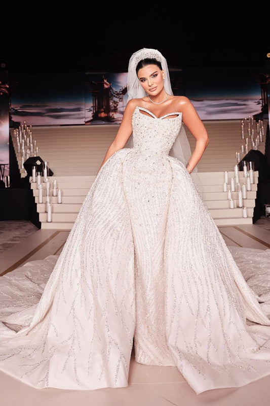 White Sleeveless Wedding Dress with Sequins and Beads on the Trail