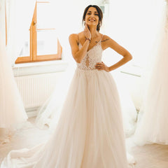 Elegant A-line Wedding Gown with Long Spaghetti Straps and Tulle