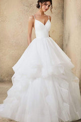 V-neck A-line Wedding Dress with Elegant Ruffles, Spaghetti Straps, and Tulle Backless Design